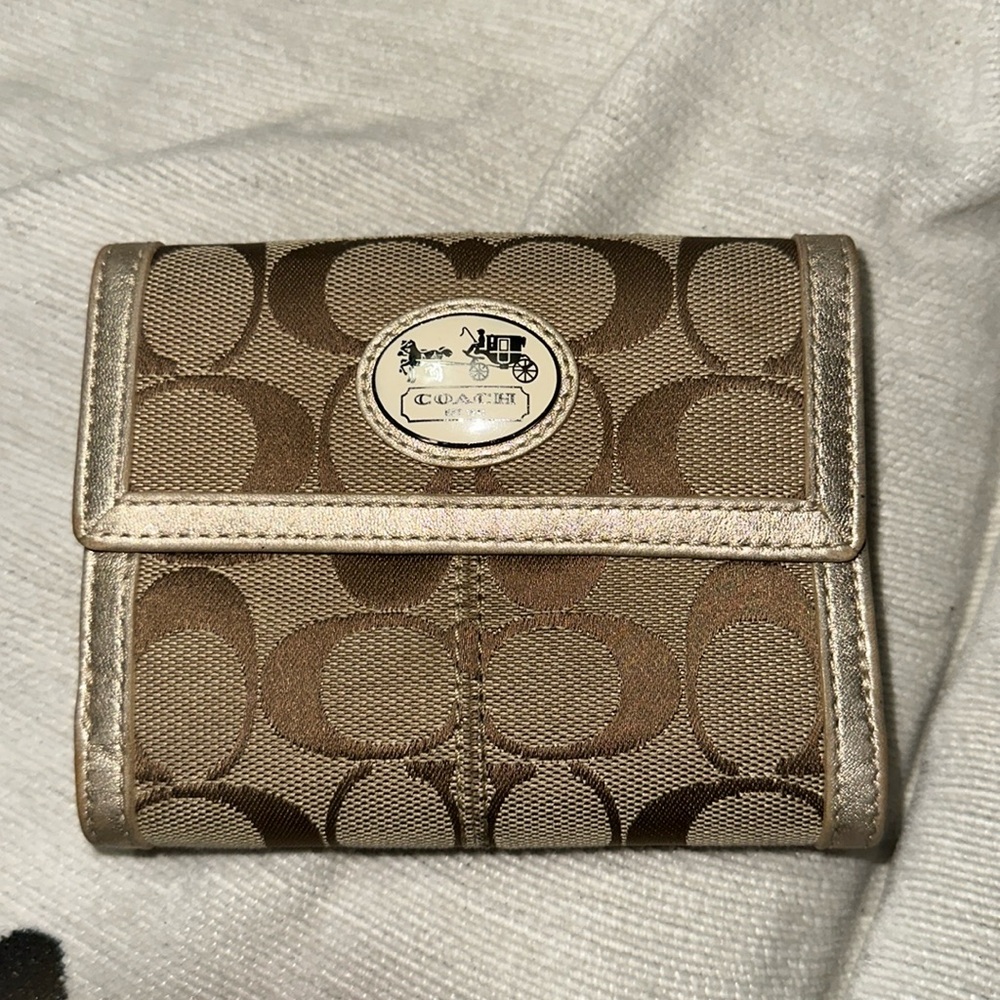 Coach tan and brown signature canvas with gold metallic leather bifold wallet